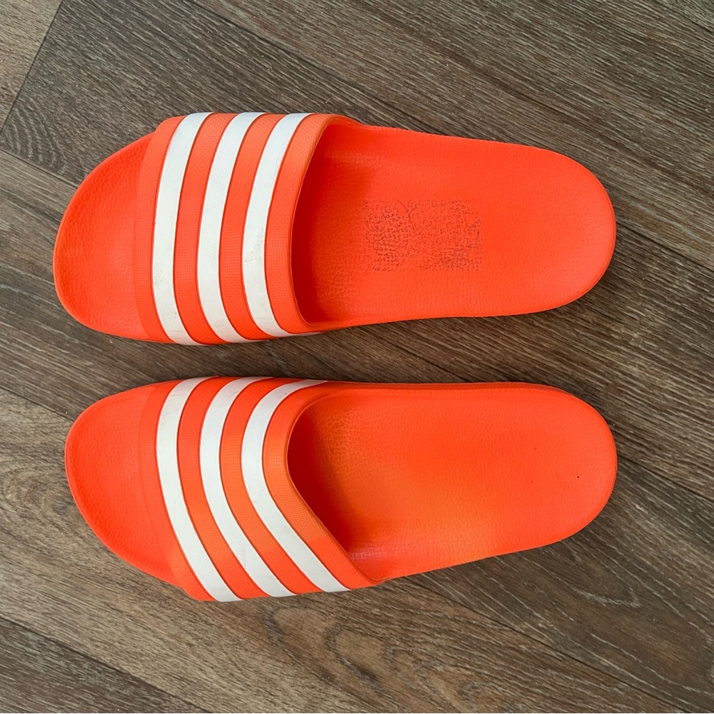 Adidas Bright Orange Slides with White Stripes